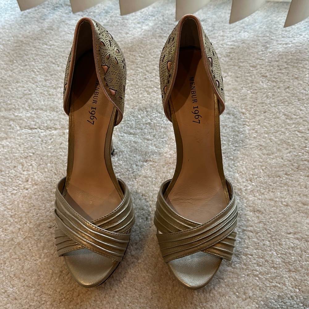 Gold toeless platforms.
